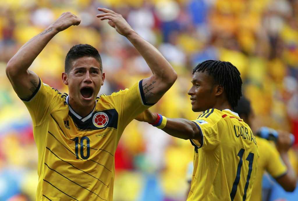 Colombia's James celebrates scoring against Ivory Coast during their 2014 World Cup Group C soccer match in Brasilia
