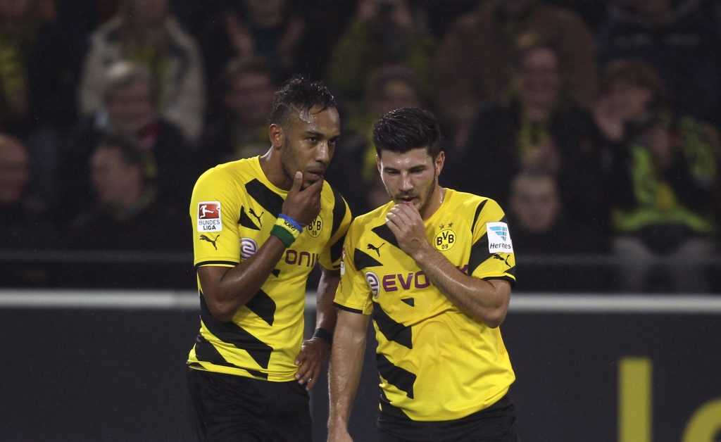 Borussia Dortmund's Aubameyang and Jojic react during their Bundesliga soccer match against VfB Stuttgart in Dortmund