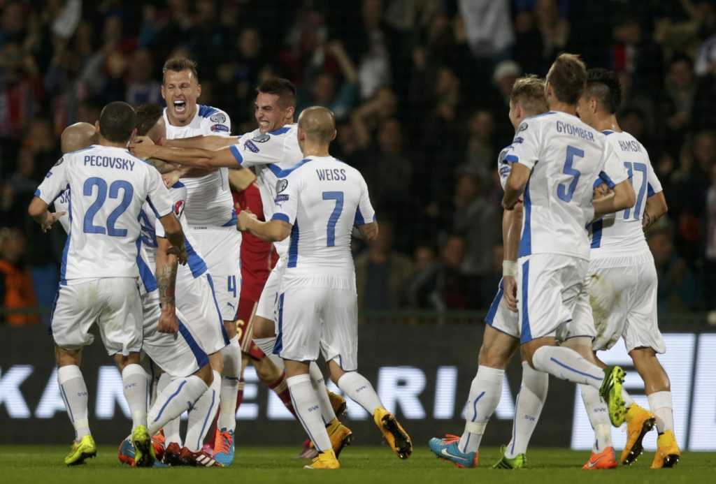 Kucka of Slovakia celebrates his goal against Spain with team mates during their Euro 2016 qualification soccer match at the MSK stadium in Zilina