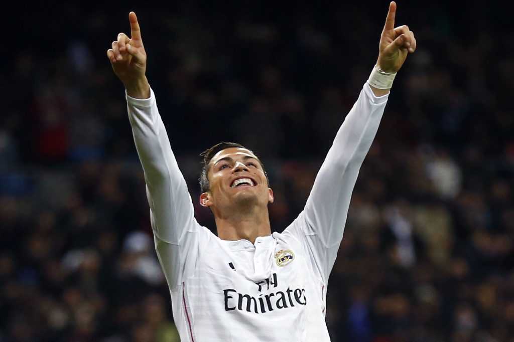 Real Madrid's Ronaldo celebrates his third goal against Celta Vigo during their Spanish First Division soccer match in Madrid