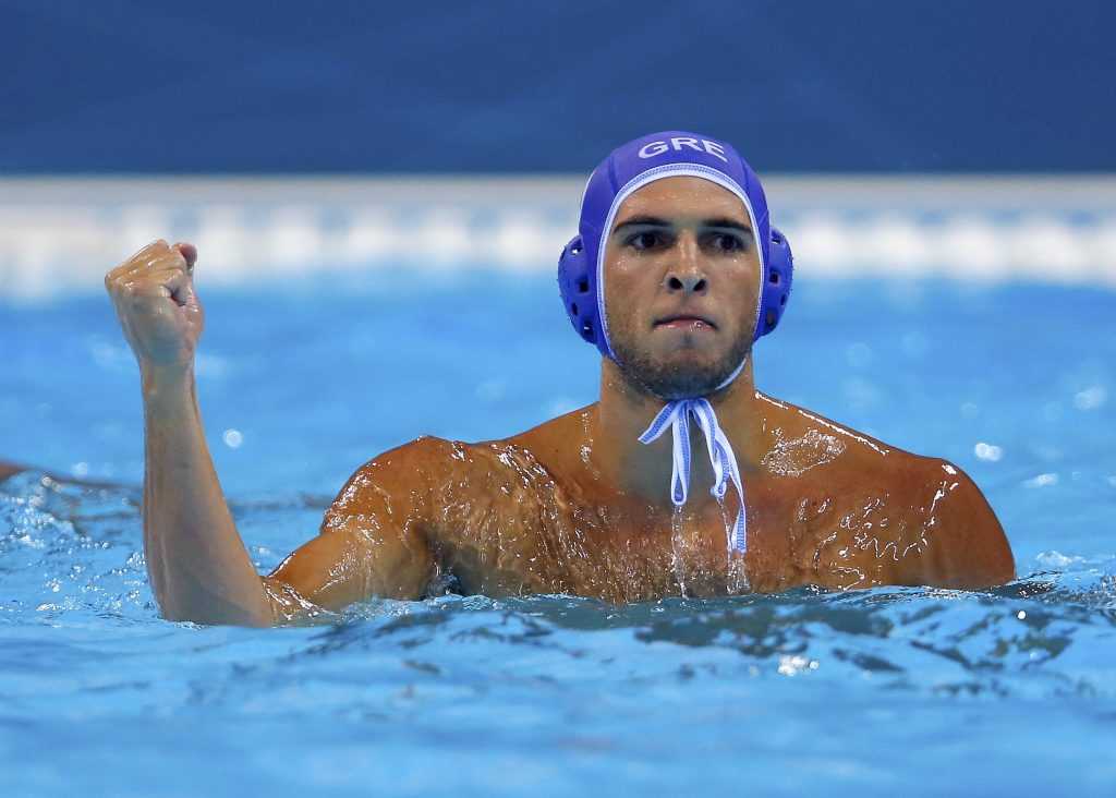 Greece's Fountoulis reacts during their men's preliminary round Group A water polo match against Kazakhstan at the London 2012 Olympic Games at the Water Polo Arena