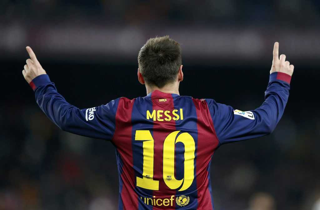 Barcelona's Lionel Messi celebrates after scoring a goal during their King's Cup quarter-final first leg soccer match in Barcelona